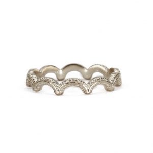 Sterling silver wiggle ring with textured details, handmade by Rosie Kent.