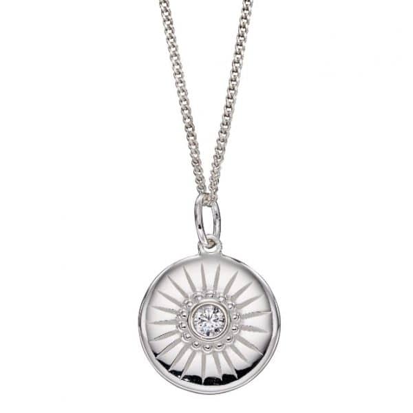 Sterling silver disc pendant with a cubic zirconia stone and engraved line details