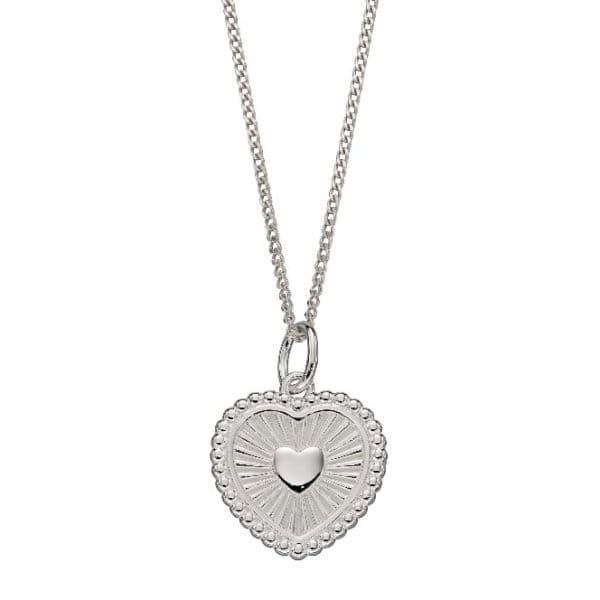 Sterling silver heart shaped pendant with an engraved sunray design