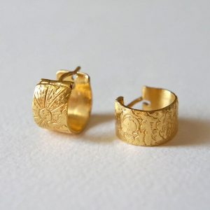 gold engraved sun and moon huggie earring
