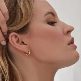 Model shot Rachel Jackson Twisted Huge Hoop Earrings