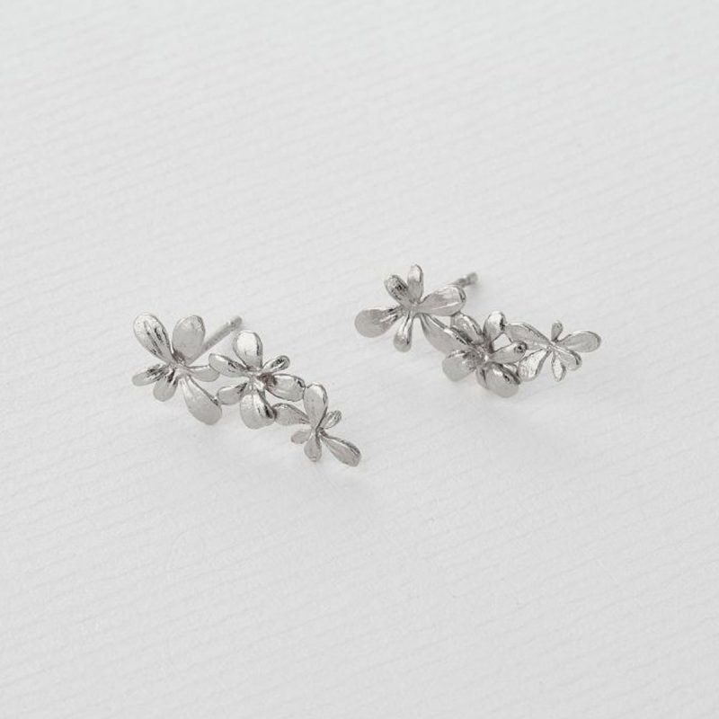 Silver rosette drop earrings
