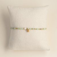 Turquoise Beaded Bracelet with Pearl and Heart Charm. AMIE, Paris